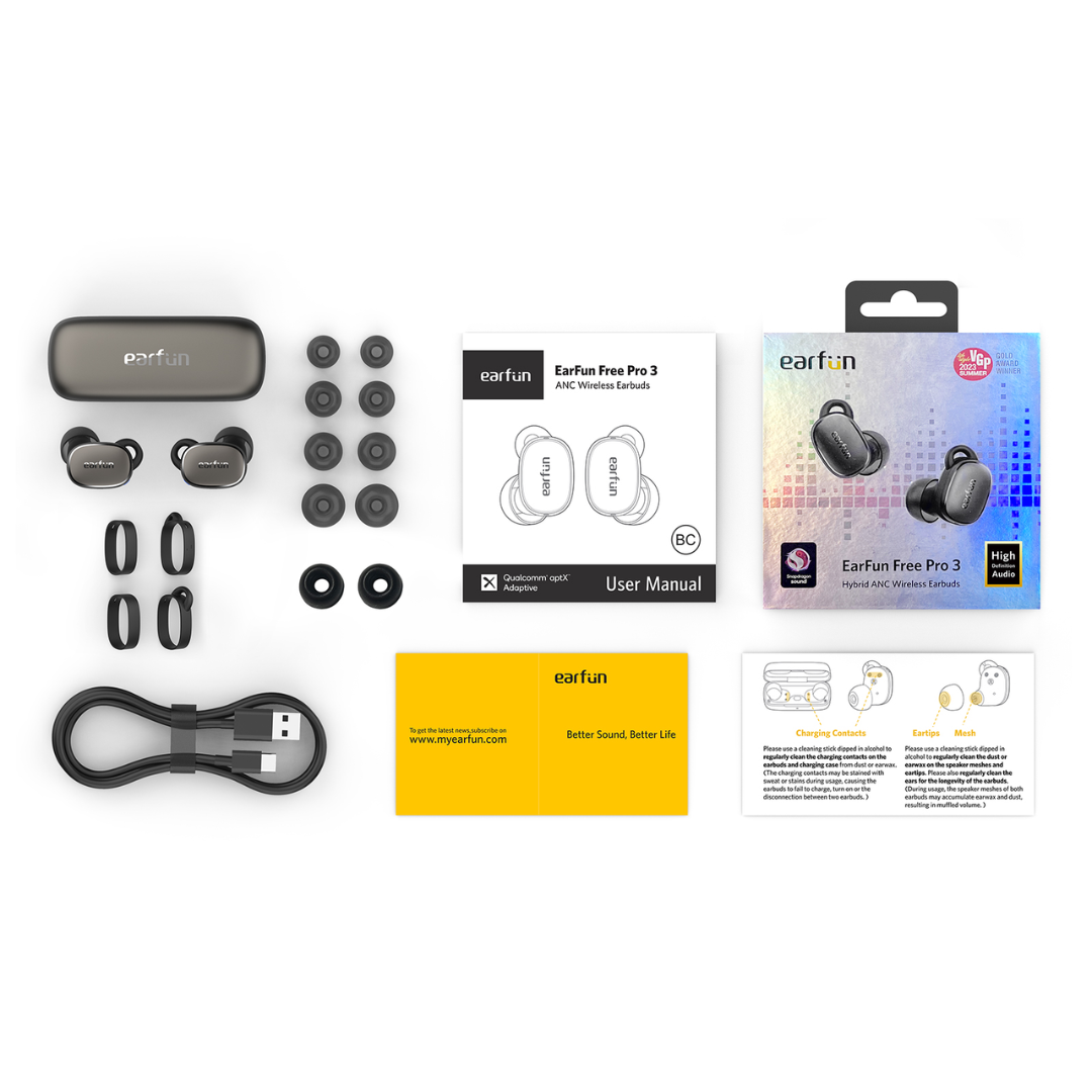 EarFun Free Pro 3 package contents laid out, including earbuds, charging case, ear tips, ear hooks, USB-C cable, manuals, warranty card, and retail box.