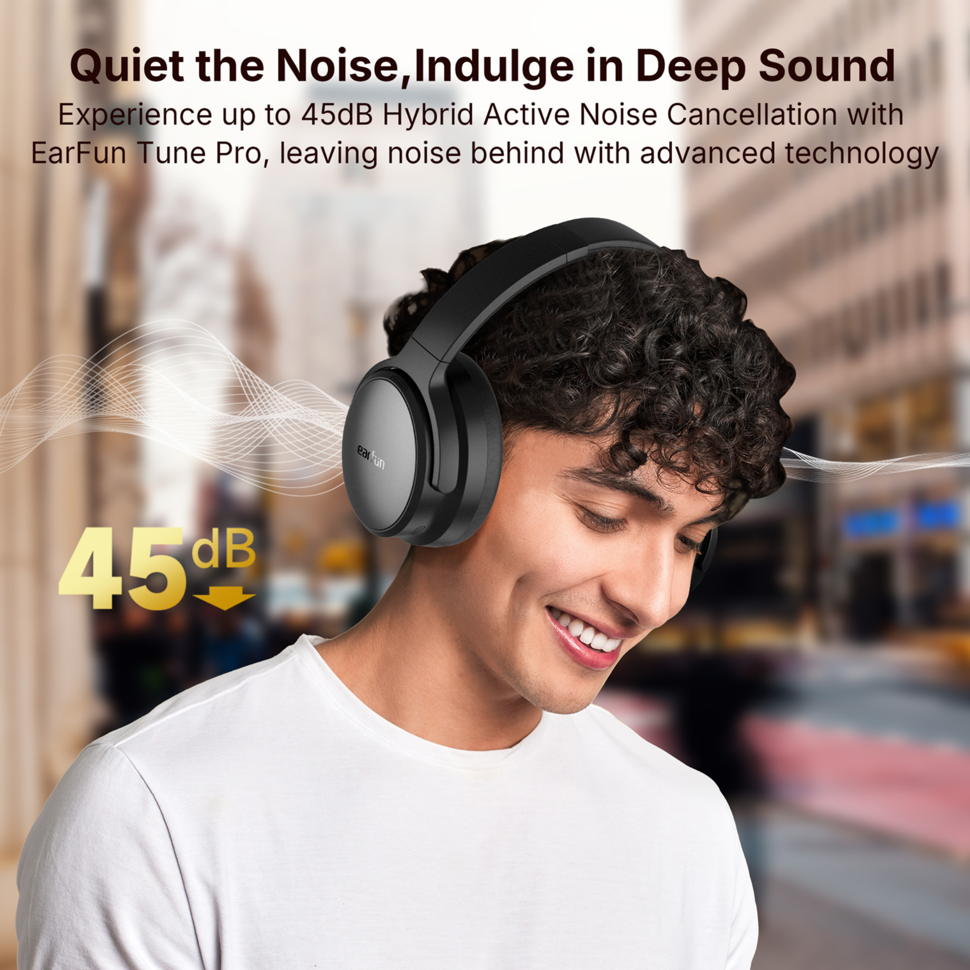 Smiling man wearing black EarFun Tune Pro wireless headphones in an urban setting, with graphics and text highlighting 45dB hybrid active noise cancellation and advanced technology