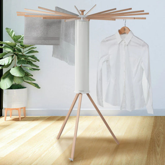 Foppapedretti Octopus Beechwood Drying Rack holding shirt and towels in modern indoor setting for efficient laundry drying