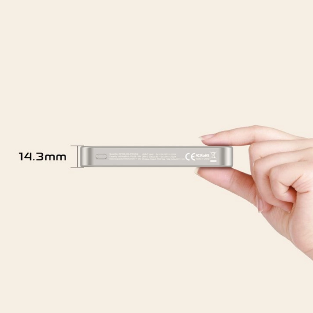 Griffin 10,000mAh MagSafe power bank in silver, showing slim 14.3mm thickness held between fingers, compact portable charger for iPhone.