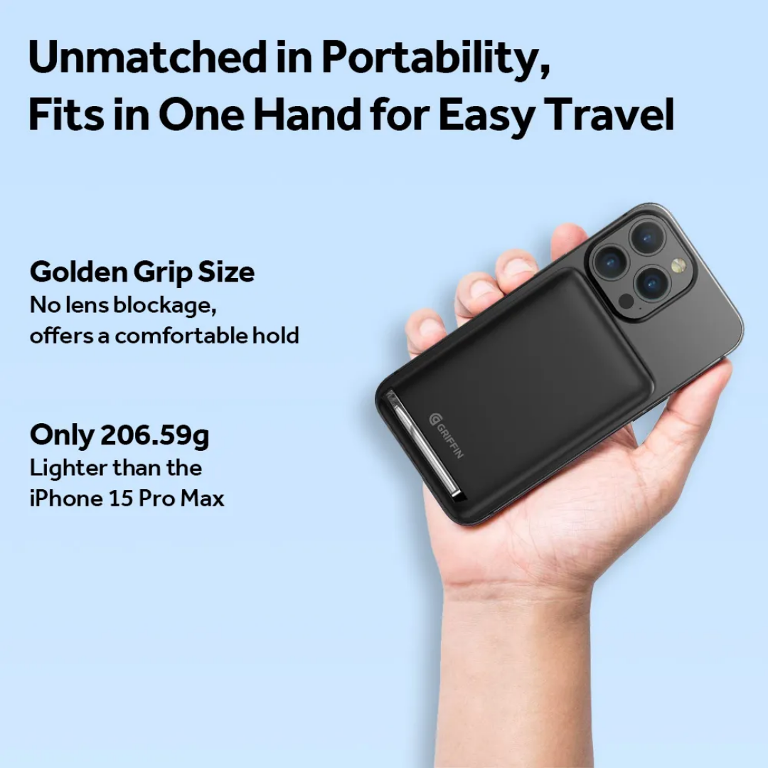 Hand holding Griffin MagSafe wireless charger attached to iPhone, lightweight portable power bank, comfortable grip, 2025 model.