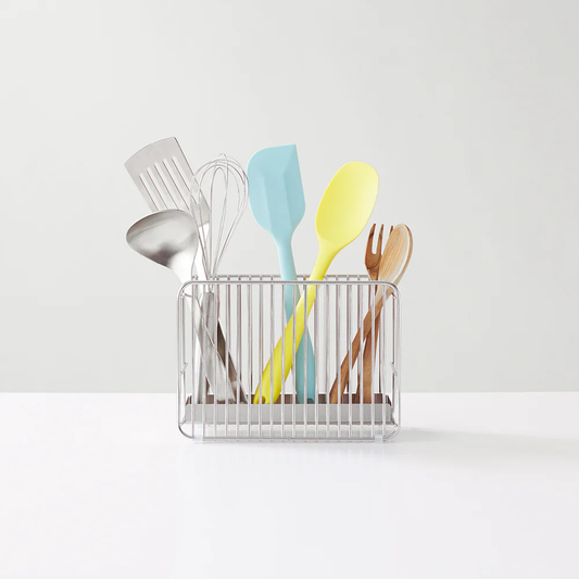 Hanauta slim stainless steel kitchen rack stand used for organising spatulas, ladles, whisks, and wooden utensils on a modern kitchen countertop.