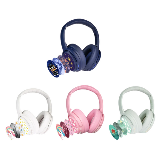 Four pairs of kids’ over-ear headphones in navy, white, pink, and mint green, each shown with a set of decorative, themed sticker discs displayed beside them, including designs like space, unicorns, flowers, and animals on a white background