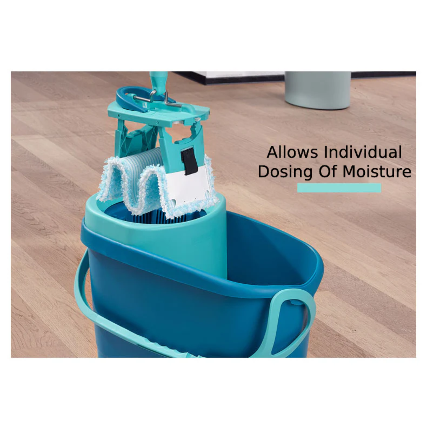 Leifheit Clean Twist Ergo mop cover spinning in bucket wringer, showing adjustable moisture control for precise damp mopping on wooden floors.