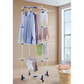 Leifheit Tower Dryer Classic 450 multi-tier indoor laundry drying rack holding shirts, towels and socks in a bright room