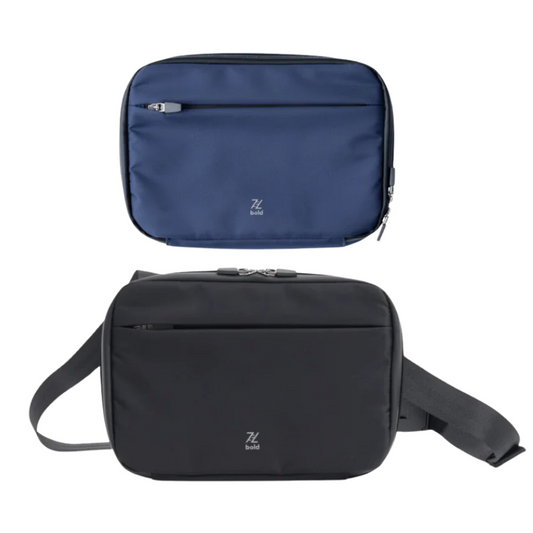Two minimalist crossbody bags, one in navy blue and one in black, both featuring a front zipper pocket and the "bold" logo, displayed on a white background. The black bag is shown with an adjustable strap