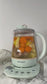 Buydeem Multi-Functional 4-in-1 Beverage Maker demo video – glass health pot for tea, soup, steaming, and stewing functions in action