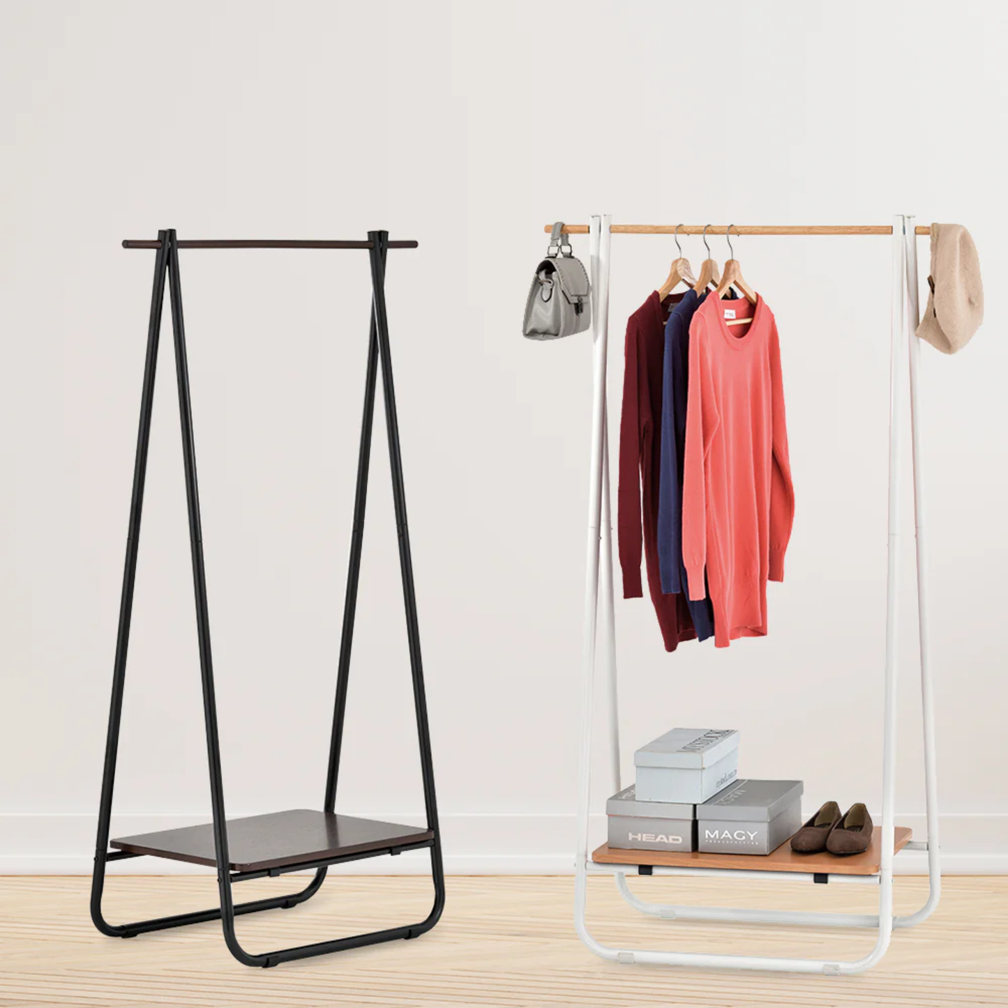 Black and white swing clothes racks with lower storage shelves, one empty and one styled with hanging clothes, bags, boxes and shoes.
