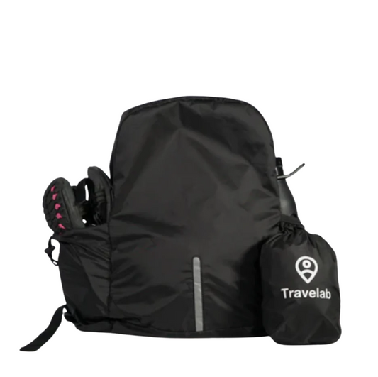 Travelab Freedom Pack ultra-lightweight black packable anti-theft travel backpack shown with side pockets holding shoes and water bottle, plus compact storage pouch.