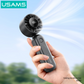 USAMS ZB352 black folding handheld fan with digital display, shown in hand for portable outdoor cooling
