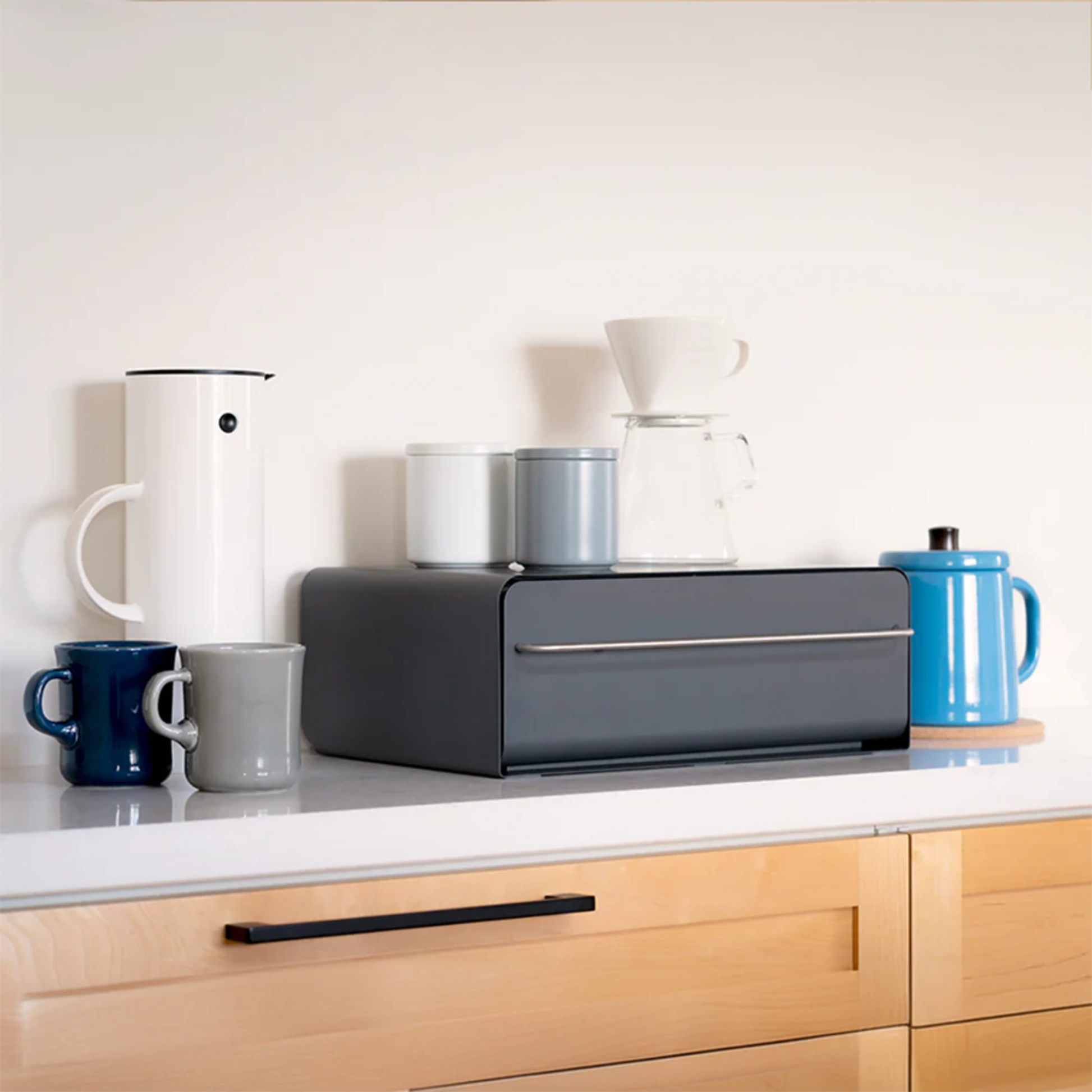 UtaU calm grey counter drawer organizer on kitchen countertop used as coffee station storage for mugs and canisters