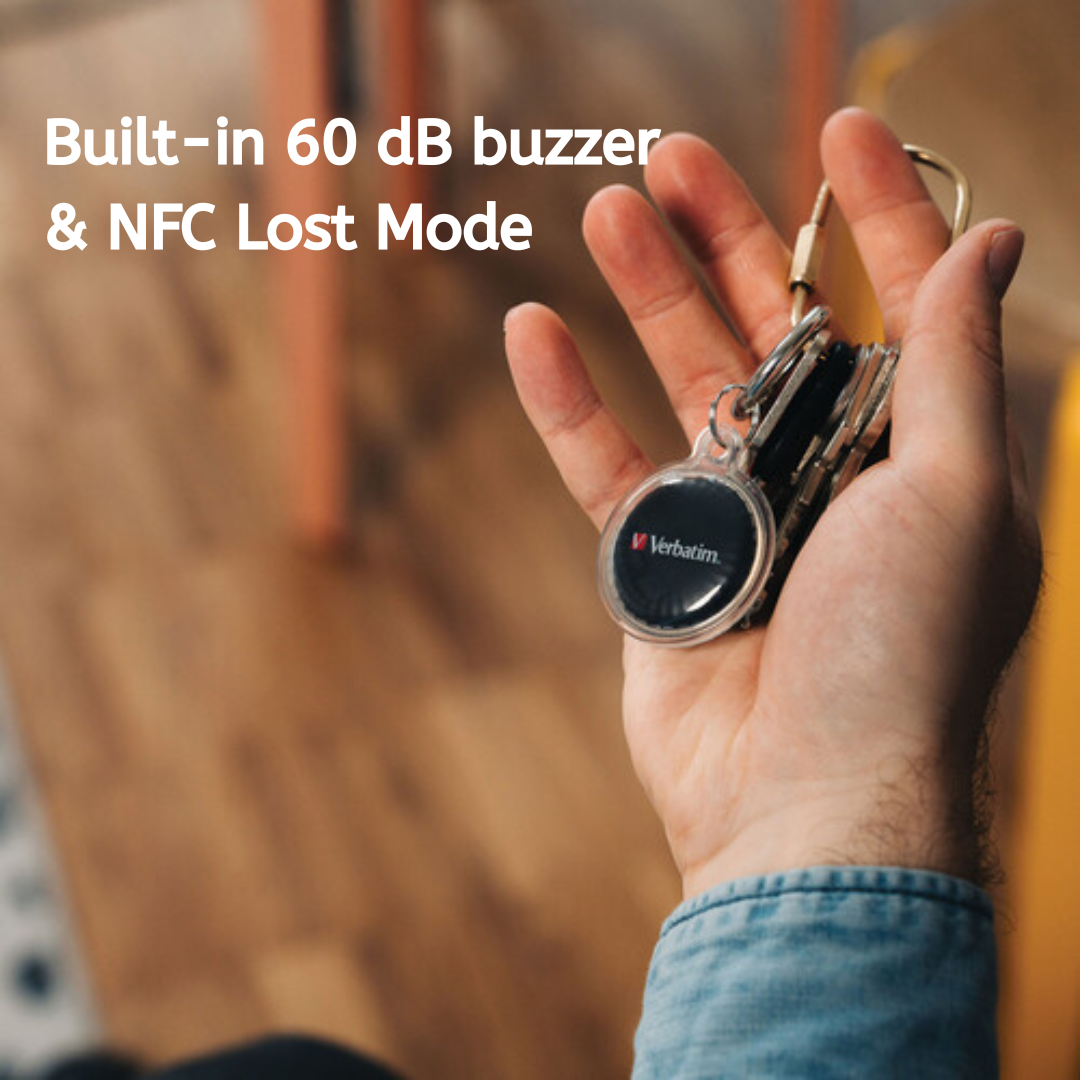 Hand holding Verbatim Bluetooth key finder with built-in buzzer and NFC Lost Mode, compatible with Apple Find My, attached to a keyring