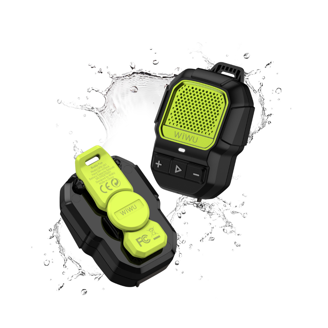 WiWU Buddy Fun Mini green and black Bluetooth portable speaker with IPX7 waterproof rating, shown with water splashes, highlighting rugged outdoor design, control buttons, and magnetic clip for adventure or travel use.