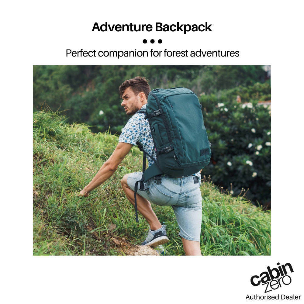 CabinZero ADV 42L Adventure Cabin Bag in Mossy Forest color, shown on a hiker climbing a grassy hillside, ideal companion for forest and outdoor adventures, available at Ideale Lifestyle