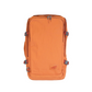 CabinZero ADV Pro 42L Adventure Cabin Bag in orange, front view, showing durable water-resistant travel backpack design.