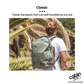 Traveler wearing CabinZero Classic 36L Travel Cabin Bag outdoors, versatile lightweight backpack for adventure and daily use