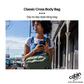 Woman wearing CabinZero Classic Cross Body 11L Companion Bag on the street, ideal for travel and daily use, day-to-day style sling bag