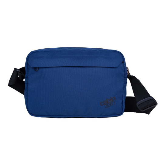 CabinZero Classic Crossbody Bag in Navy Blue with adjustable strap, front pocket, and logo detail