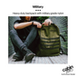 CabinZero Military 44L Adventure Cabin Bag in olive green, heavy-duty nylon, featured in outdoor lifestyle setting with user on metal walkway