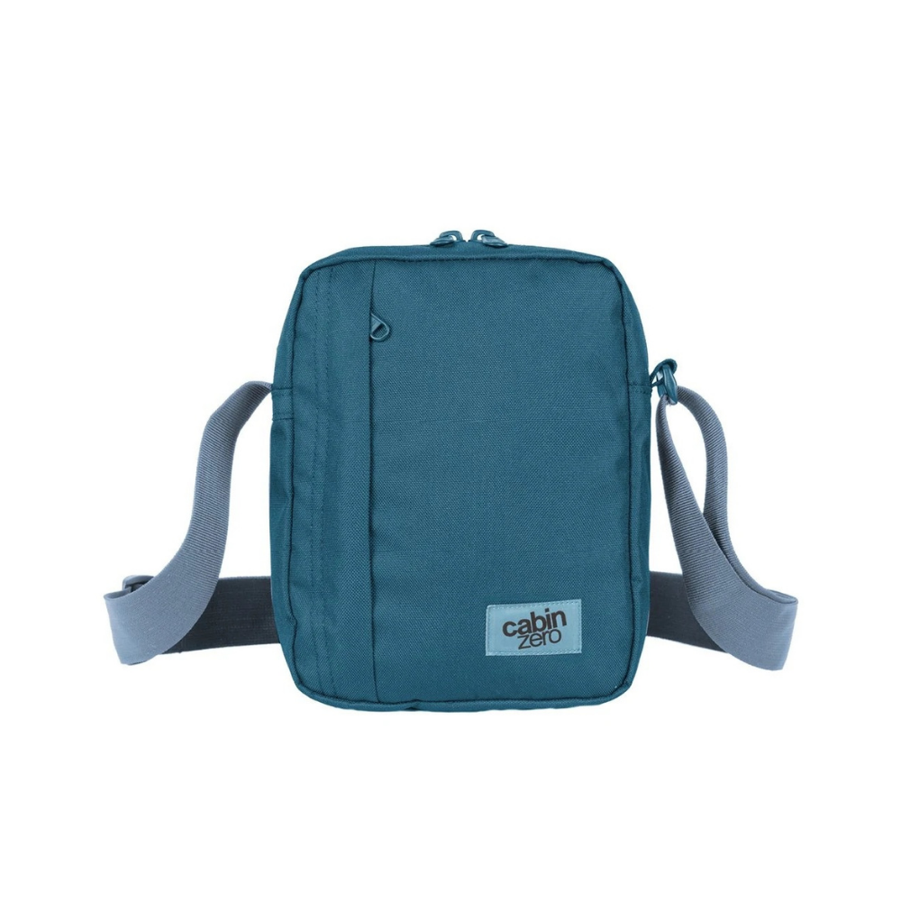 CabinZero Sidekick 3L Sling Bag in aruba  blue, compact crossbody bag with adjustable strap, ideal for everyday essentials and travel