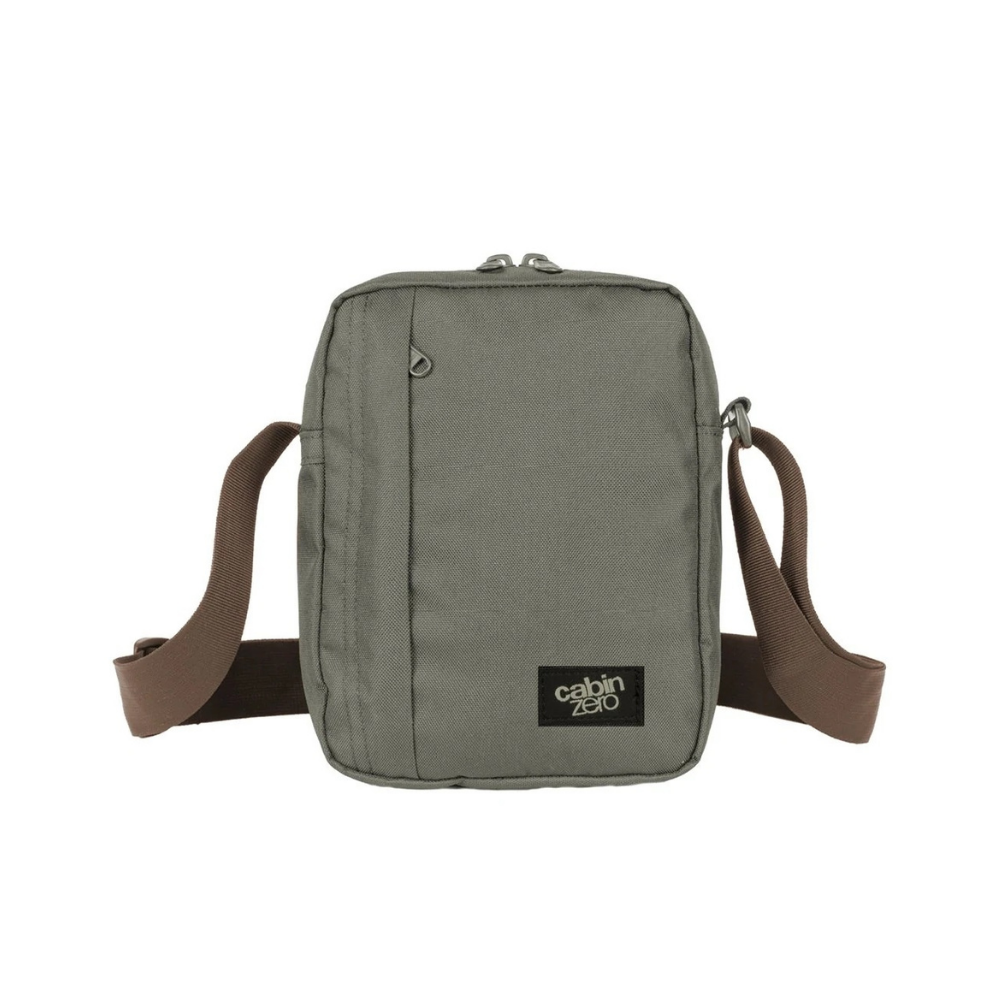 CabinZero Sidekick 3L Sling Bag in georgian khaki, compact lightweight crossbody bag with brown adjustable strap for casual or travel use